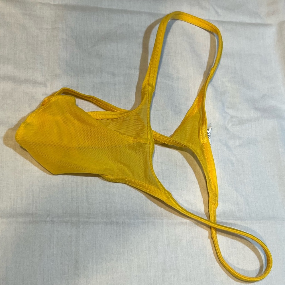 NWOT yellow men’s thong ( sheer and soft )